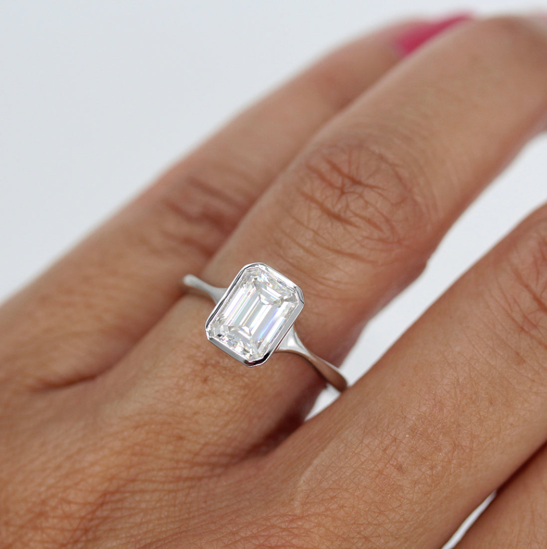 Solitaire Colorless Bezel Emerald Cut Moissanite Engagement Ring